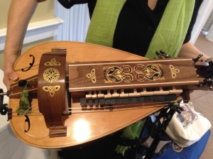 Leah Trent holds her beautiful vielle/hurdy-gurdy (close-up)
