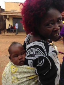 A Muganda woman from Busibo carries her sleeping son. May he dream big dreams!